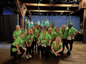 Ladies of Louisiana LunaChicks posing for a group shot after the St. Patrick's Day parade 2024